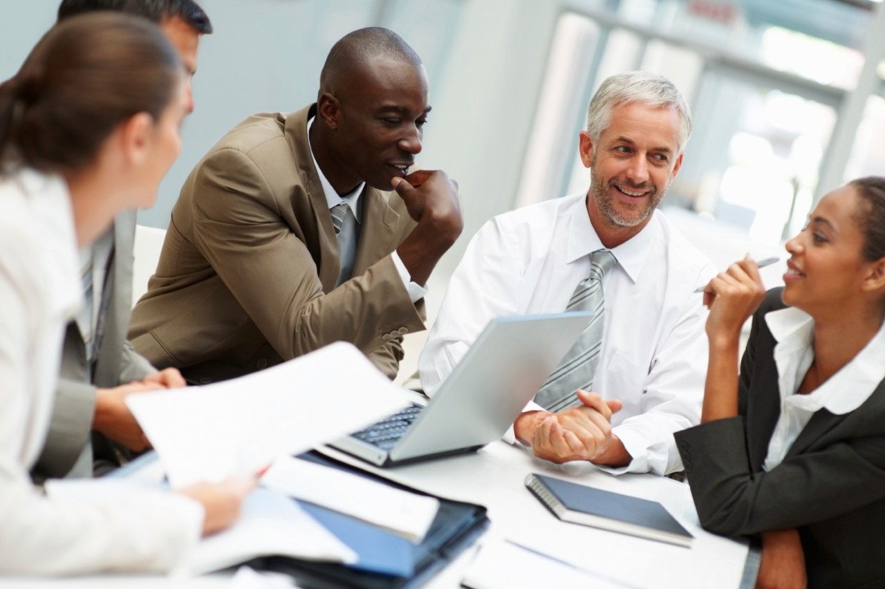 Portrait of creative business people busy in a conversation at the meeting