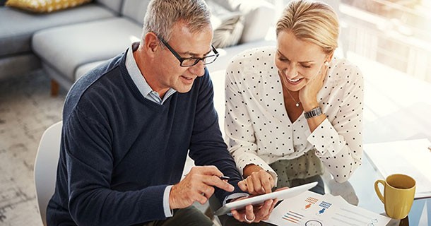 image of couple looking at bill